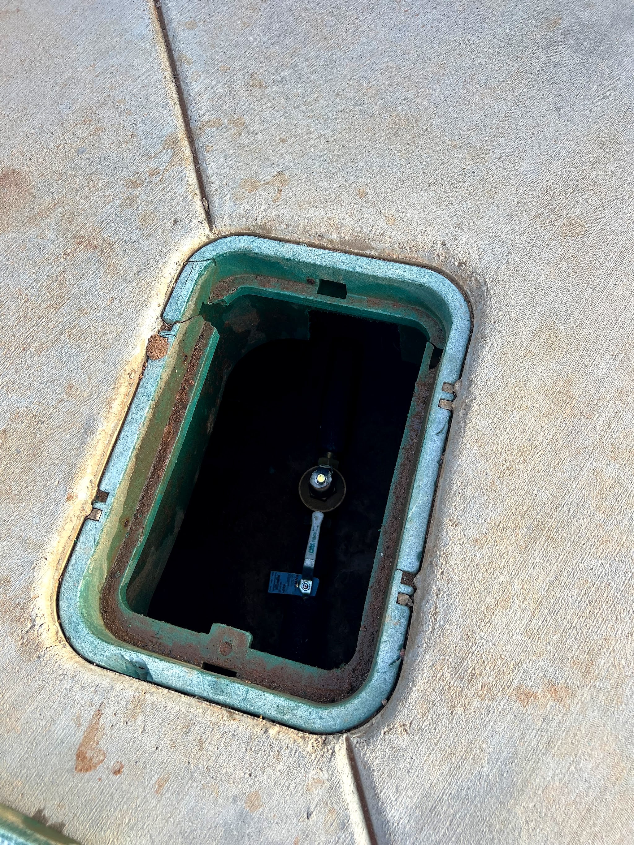 Water meter and shutoff box in the ground