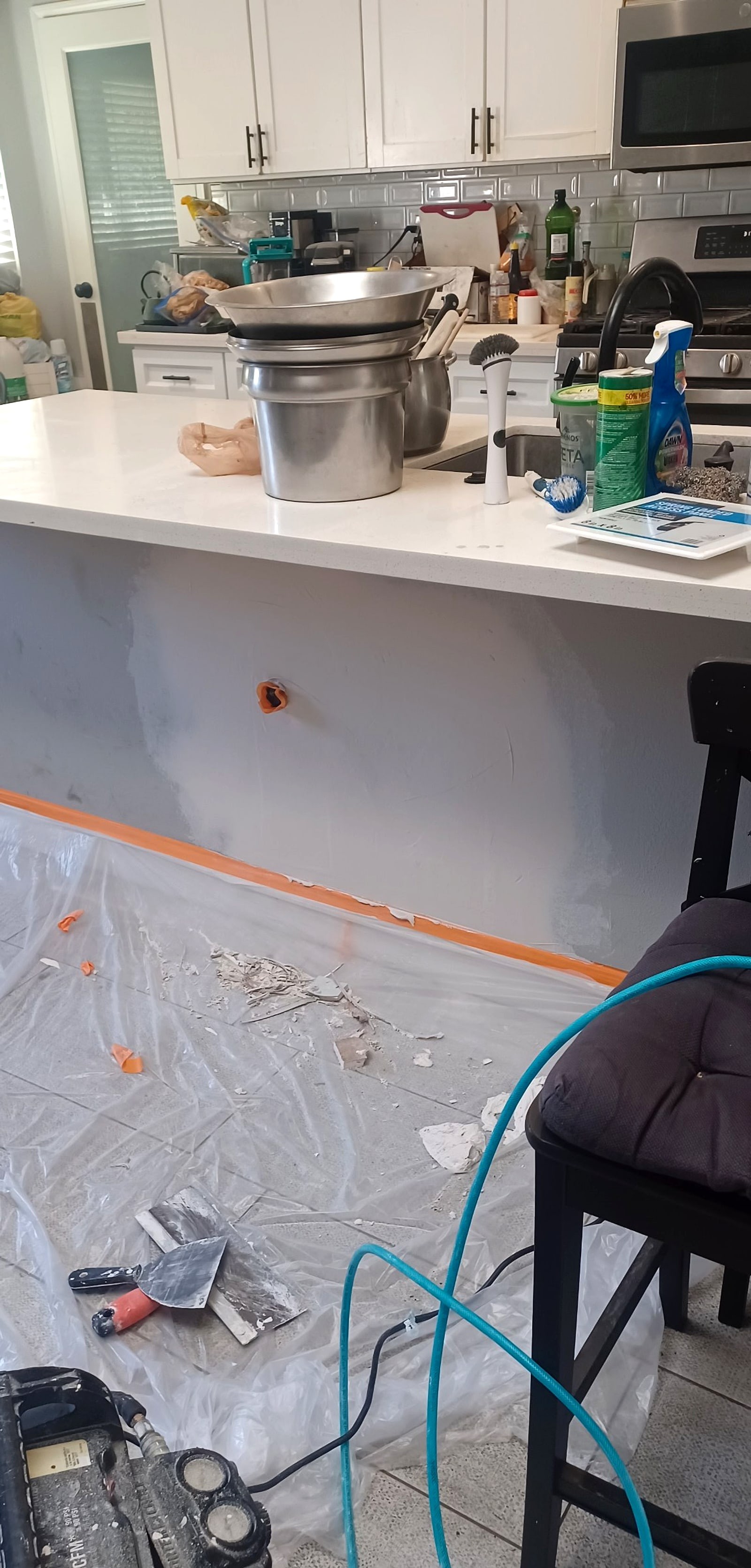 Kitchen island opened up during a plumbing repair